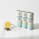 Fever-Tree Refreshingly Light Tonic Water cans with lemon and botanicals on white marble