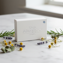 Unda Allergiplex homeopathic tablets 10 tabs with dried botanical flowers on marble surface