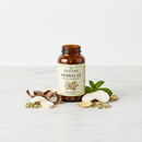 Genestra Herbal GI supplement bottle on marble surface with slippery elm and ginger botanical accents