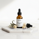 UNDA Cholesterinum Plex 30mL homeopathic complex drops on marble surface