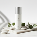 Dr. Mist Unscented deodorant spray bottle with white stones and eucalyptus on white marble