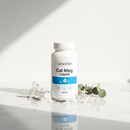 Genestra Cal Mag Liquid 1000ml supplement bottle on marble surface
