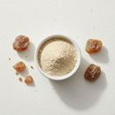 Boswellia extract powder 65% boswellic acids in a white ceramic bowl with resin pieces on white background