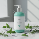 SBT Peppermint Shampoo 350mL bottle with fresh peppermint leaves and water droplets on marble surface