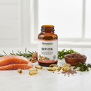 Genestra SEP EFA essential fatty acids supplement bottle on marble surface with flaxseeds and botanical accents