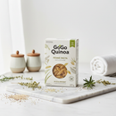GoGo Quinoa Penne Rice Amaranth pasta on marble surface with botanical accents