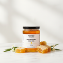 Manuka Health Manuka Honey 500g jar on white marble surface