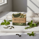 SBT Tea Bar Soap 110g with dried green tea leaves and botanical accents on marble surface