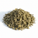 Dried horehound herb cut and sifted on white background