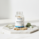 Genestra Selenium + E antioxidant supplement bottle on marble surface