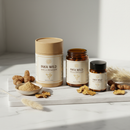 Inka Wild Maca capsules on marble surface with botanical accents