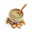 Bitter Melon Seed Powder in a ceramic bowl with wooden spoon on white background
