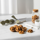 Premium California Walnuts on marble surface