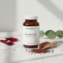 Nutridom Red Yeast Rice 60 Capsules – premium apothecary supplement bottle on marble surface