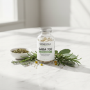 Genestra GABA 700 supplement bottle on marble with calming botanical accents