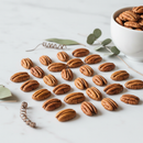 Premium pecan halves on marble surface